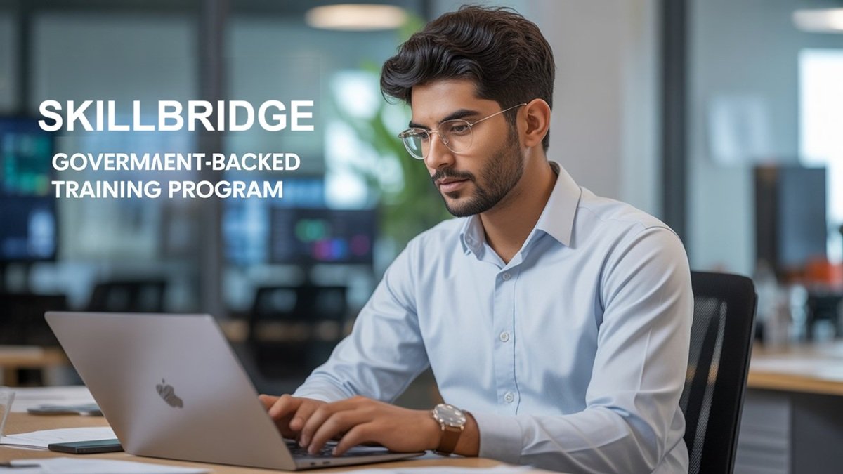 IT graduates working on computers in modern office