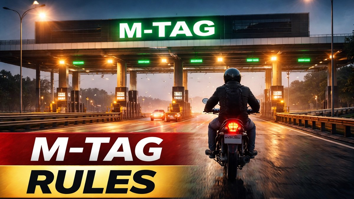 Motorcyclist at motorway toll plaza showing electronic M-Tag system in Pakistan