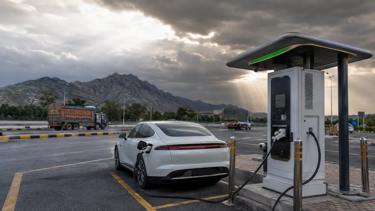 Explained: Pakistan's First Real EV Charging Network Finally Works Pakistan EV charging network 2026 with electric vehicle charging at a motorway station between Islamabad and Lahore